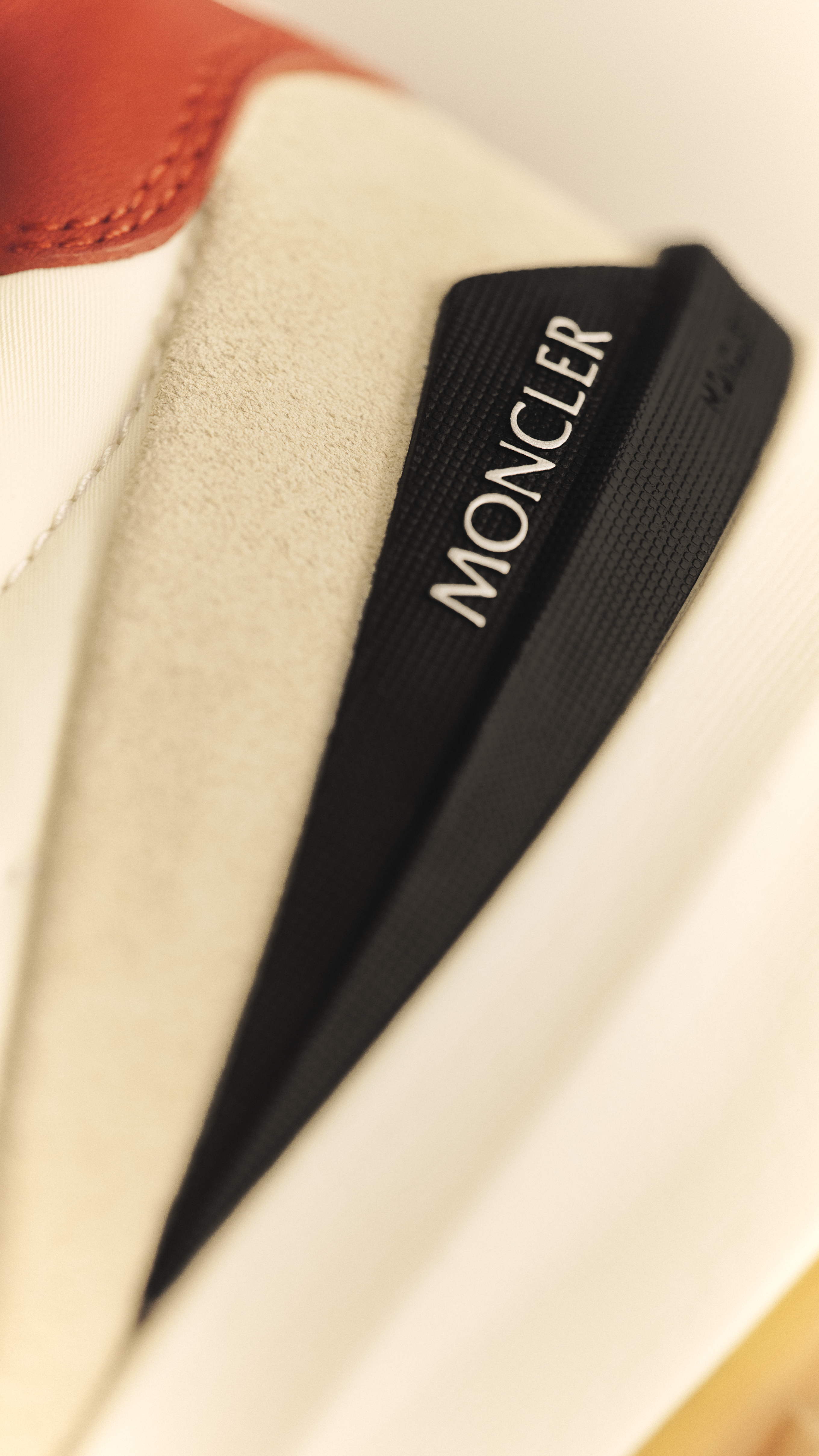 Moncler CityTrek: close-up of sneaker details, logo, label and front view.