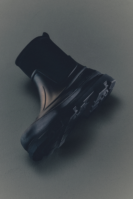 Moncler footwear for men. Black leather ankle boot with chunky lug sole.