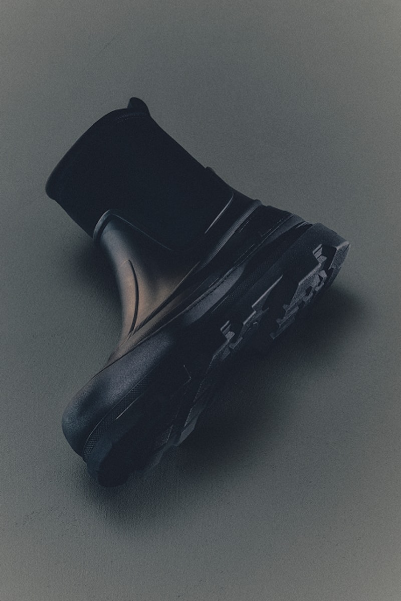 Moncler footwear for men. Black leather ankle boot with chunky lug sole.