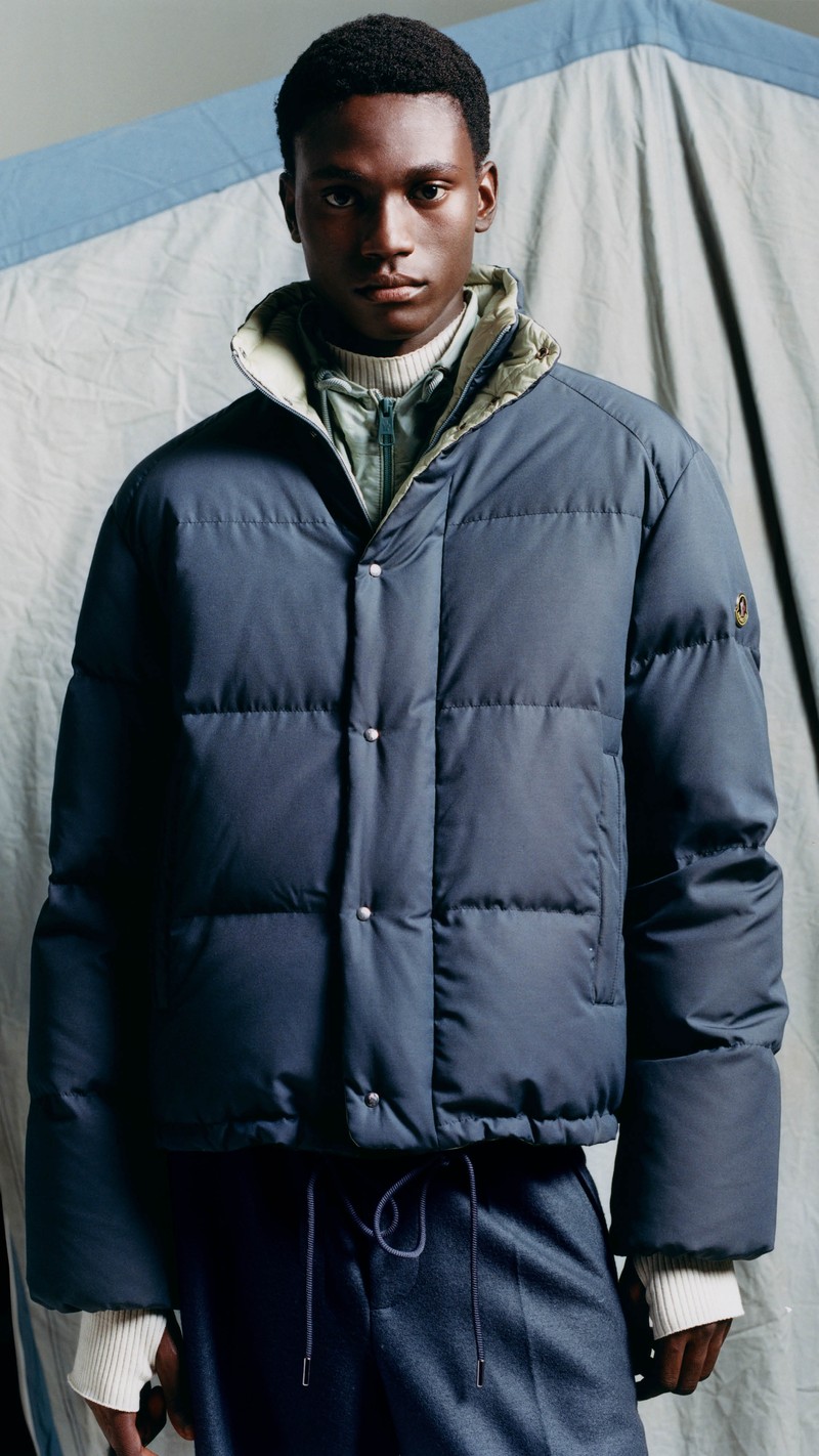 Moncler Re/Icons 2026, slate blue Verone down jacket and high-neck sweater.