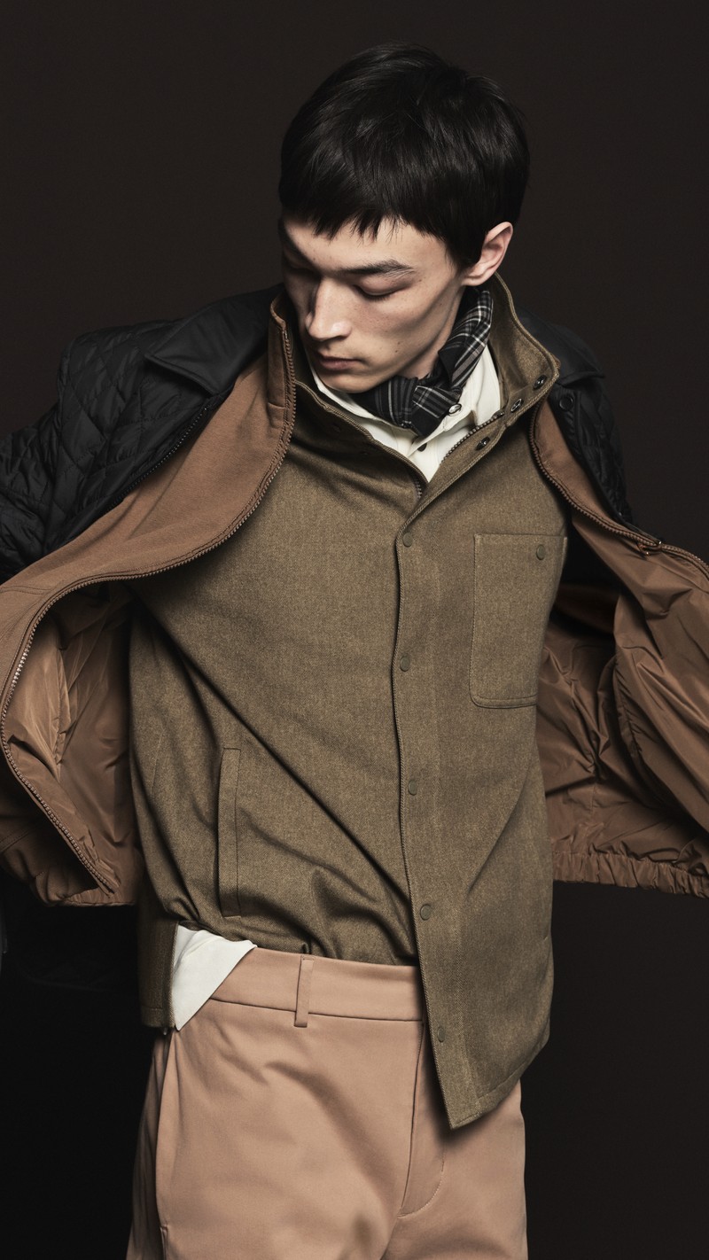 Moncler Men's Fall Winter collection, white shirt, green shirt, brown jacket and black lightweight puffer.