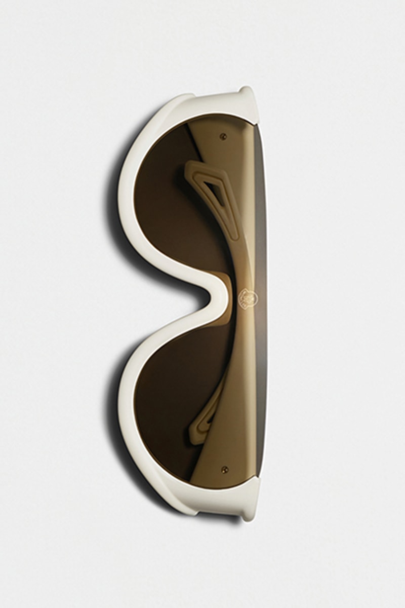 Moncler sunglasses for women. Ivory shield sunglasses with brown lenses.