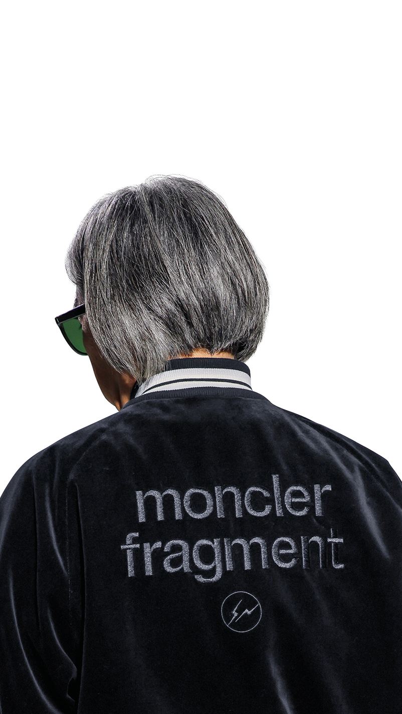 Moncler x Fragment by Hiroshi Fujiwara. Black velvet bomber jacket with tonal Moncler x Fragment logo.