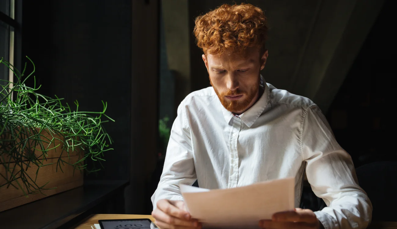 Business man reviewing paper work