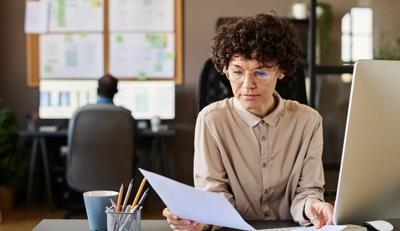 Business woman reading a report
